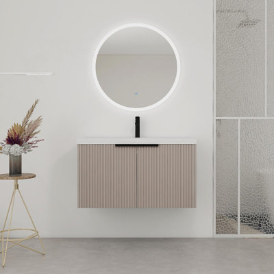 Meuble-lavabo mural avec lavabo en résine et portes à fermeture en douceur, offrant beaucoup de rangement et une conception unique pour améliorer la salle de bain