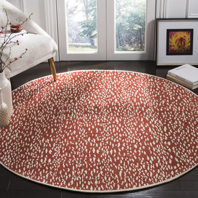 Tapis performance tissé à la main à imprimé animalier Donnellson