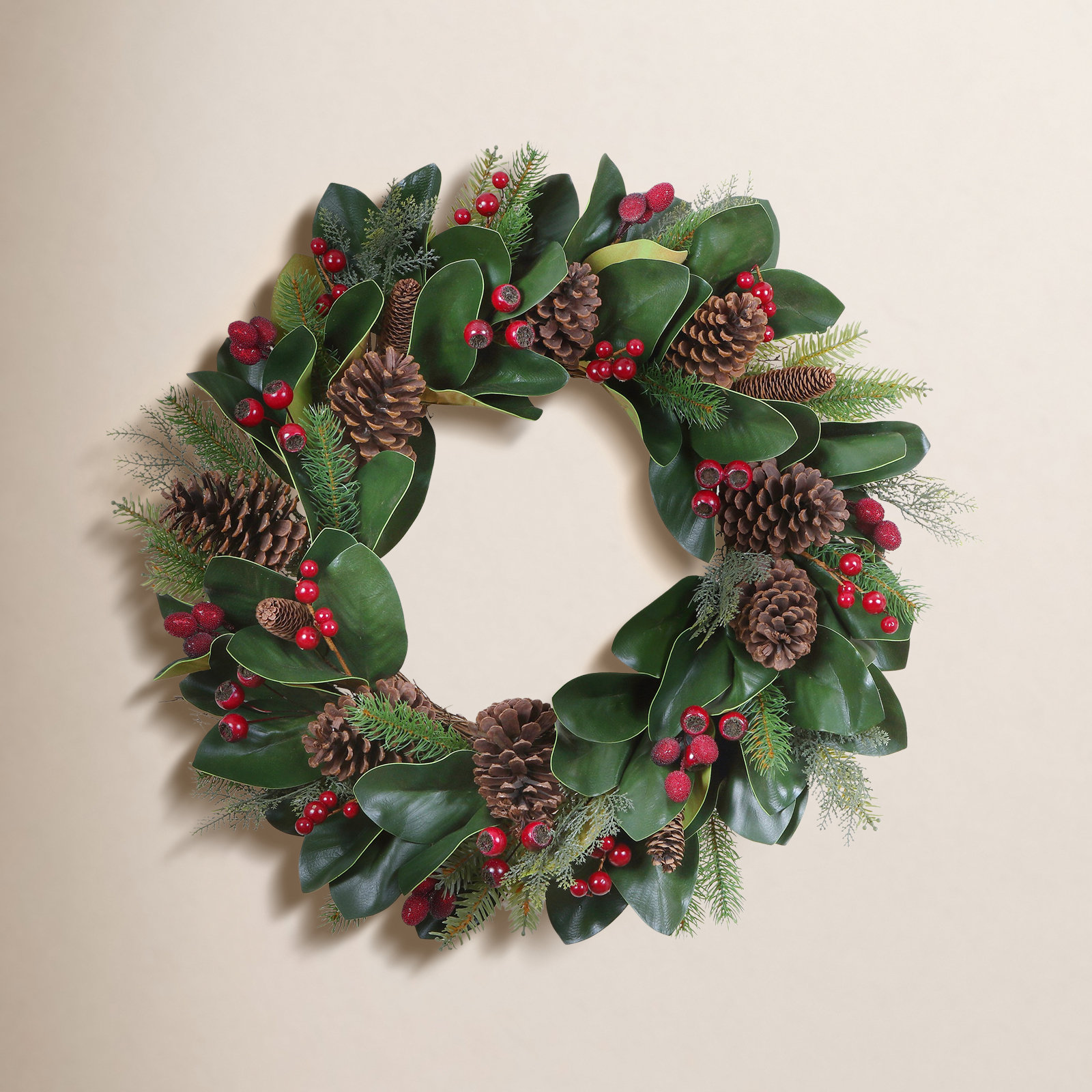 CHRISTMAS MAGNOLIA W BERRY CONE WREATH
