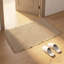 Tapis d'entrée en polyester 60 x 90 cm Waffle Weave Tassel
