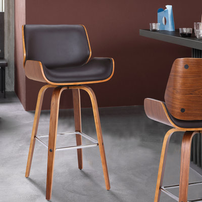 Alli Swivel Faux Leather Counter & Bar Stool with Wood Legs and Metal Footrest by George Oliver