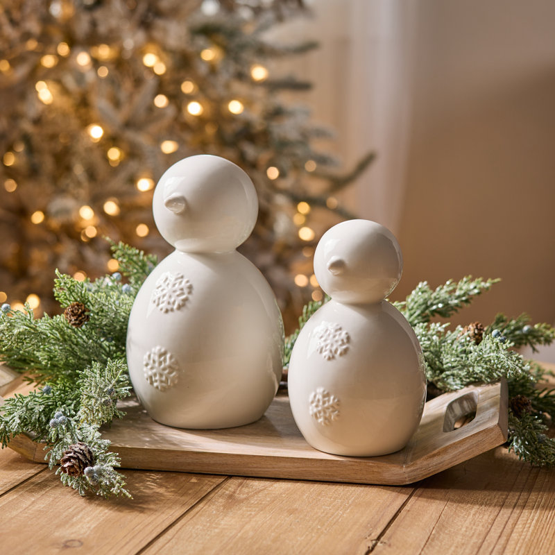 Figurines de bonhomme de neige avec détail de flocon de neige