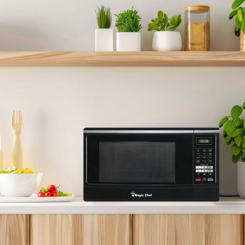 Magic Chef 1.6 Cubic Feet 1100 Watt Countertop Microwave, Black