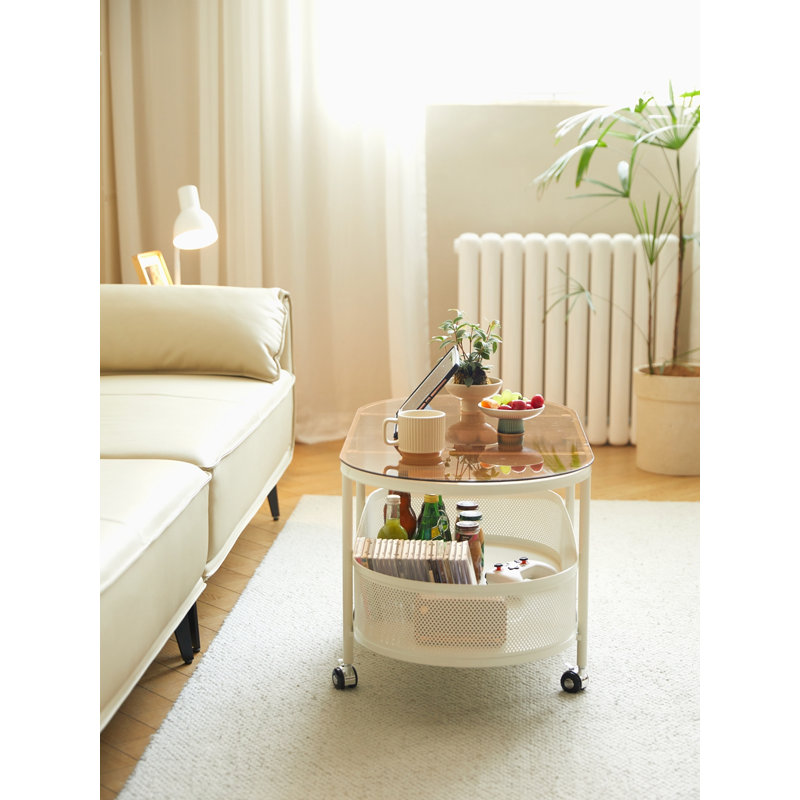 Table basse mobile ovale en verre et métal avec rangement