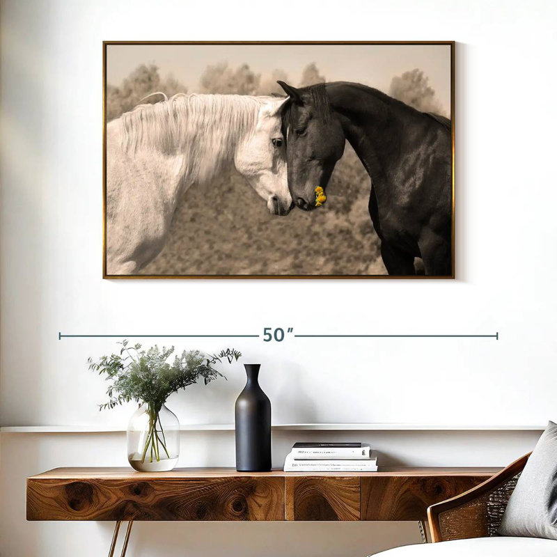 Doux chevaux noirs et blancs, Cadre flottant doré, 40 po x 27 po