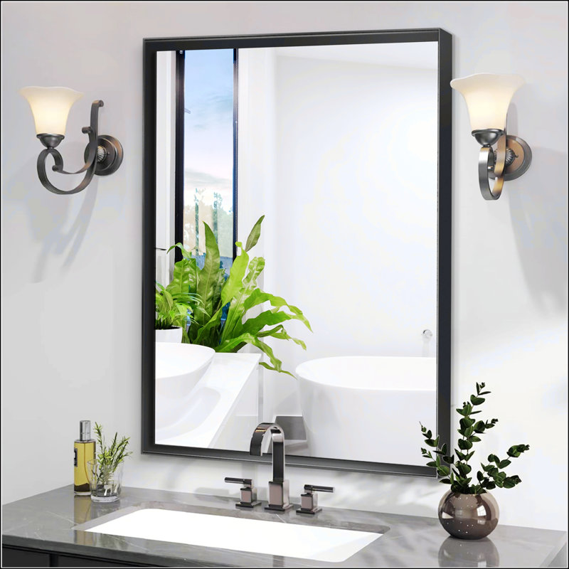Miroir de salle de bain moderne avec verre flottant et cadre résistant à la rouille, idéal pour un montage mural et pour améliorer l'esthétique de la pièce.