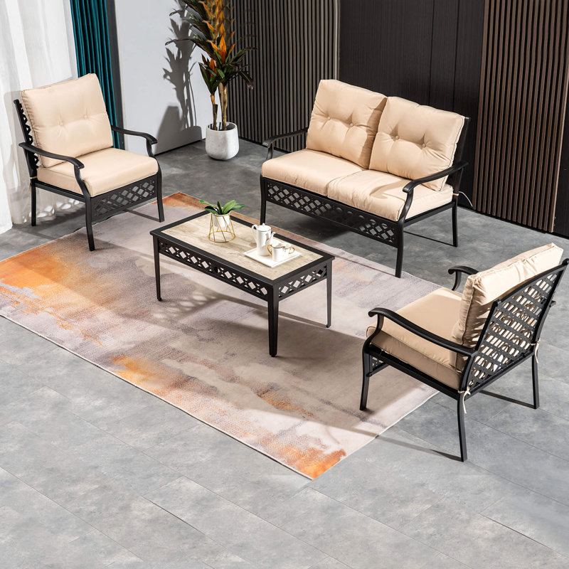 Ensemble de meubles de patio 4 pièces avec coussins et table basse Harborough