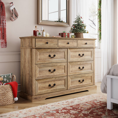 L'ensemble de chambre à coucher 3 pièces comprend une commode à 9 tiroirs et deux tables de chevet