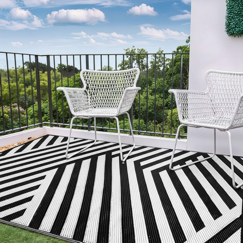 Tapis d'extérieur imperméable réversible à motif rayé noir et blanc