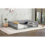 Lit plateforme en bois robuste avec garde-corps et coussin pour un sommeil relaxant