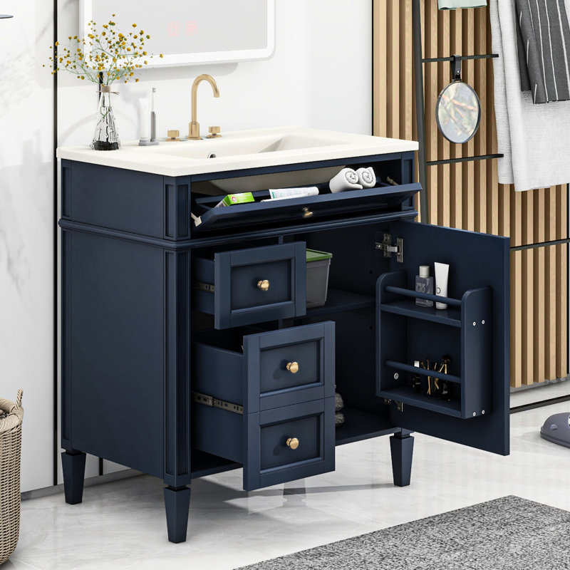 Meuble-lavabo moderne de 76 cm avec lavabo, armoire bleue à 2 tiroirs et rangement fonctionnel.