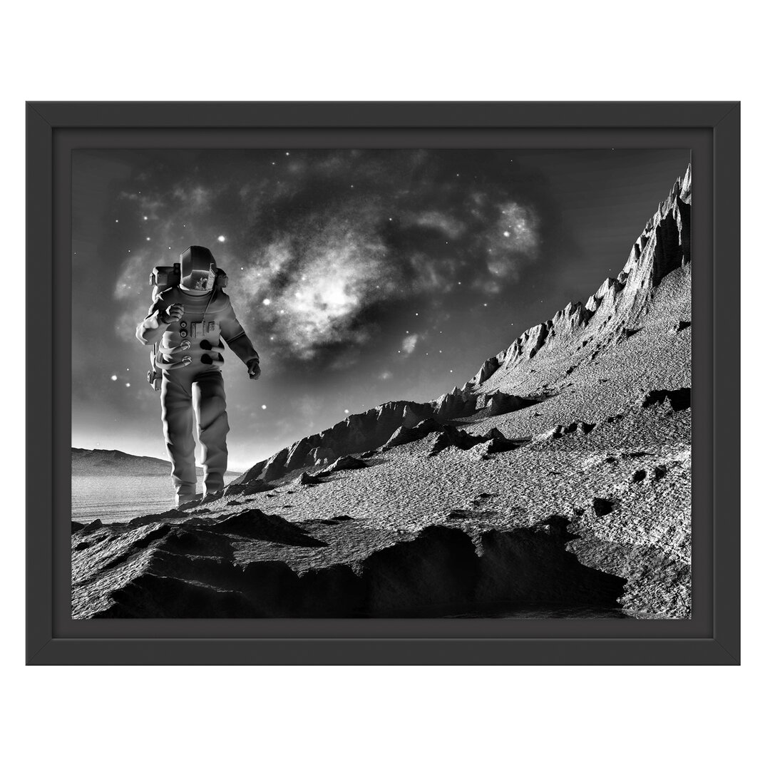 Gerahmtes Wandbild Astronaut klettert auf den Mond