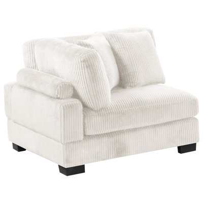 Coussin de coin moderne en velours côtelé crème, soutenu par des pieds, coin détente recouvert de velours côtelé, look contemporain, note moyenne