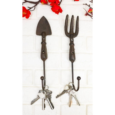 Paquet de 2 crochets muraux pour fourche et truelle en fonte