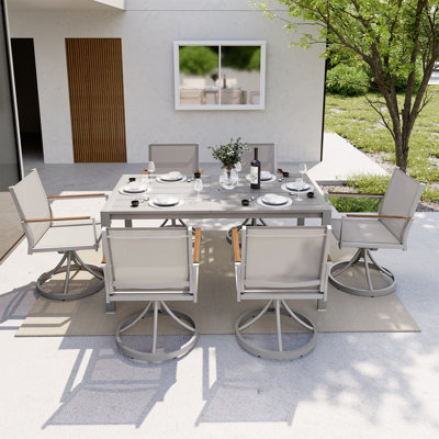 Ensemble de salle à manger 7 pièces en aluminium avec table rectangulaire et chaises pivotantes en tissu PVC-coated polyester