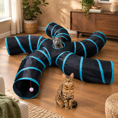 A Large Blue & Black S-shape 5 Way tunnel folds for indoor use and combines a play ball with an interactive peek hole for puppies, kitties, kittens, and rabbits.
