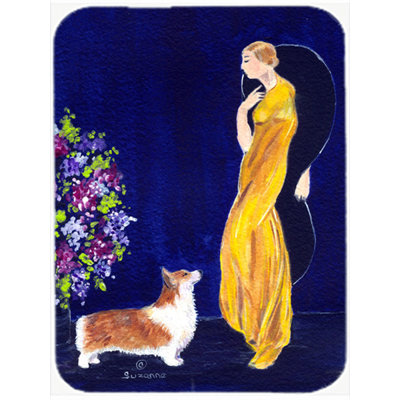 Caroline-trésors avec sa planche à découper en verre corgi