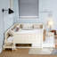 Bed with Built-in Bookshelves and Small Staircase-522426298-522426302