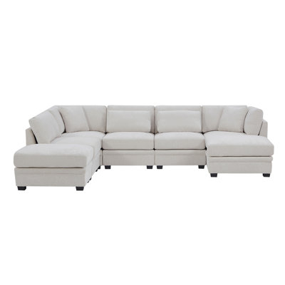 Canapé modulaire réversible en coin 7 pièces beige (deux fauteuils d'angle, trois fauteuils sans accoudoirs et deux repose-pieds)