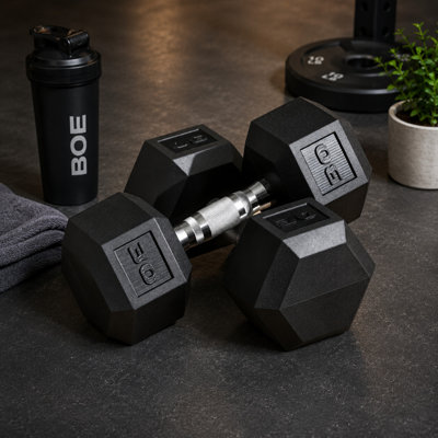 Ensemble d'haltères noirs à usage domestique et commercial, poids total 60 lb, haltères individuels 30 lb, équipement de musculation à la main.
