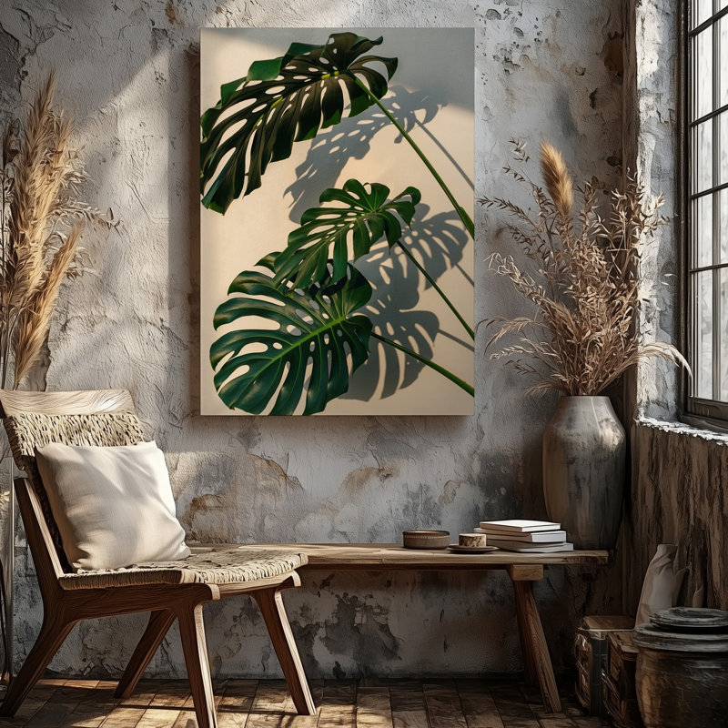 Toile, composition rapprochée de feuilles de Monstera vibrantes avec leur art mural, motifs iconiques divisés et perforés