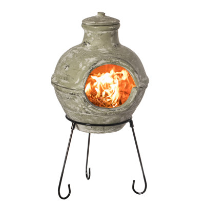 Foyer d'extérieur beige avec barbecue Chiminea