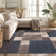 Tapis bleu touffeté à motif géométrique Allyne
