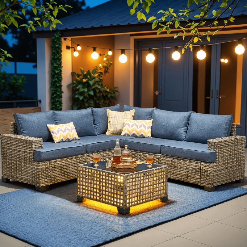 Canapé modulaire en osier pour 5 personnes avec coussins et table en verre Tommy, Bleu