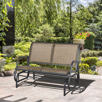 2 bancs à bascule. Fauteuil à bascule double pour patio, couleur marron. Structure en acier avec revêtement en poudre. Toile confortable et imperméable. Supporte jusqu'à 200 kg. Basculement doux et résistant à la chaleur. Parfait pour le jardin.