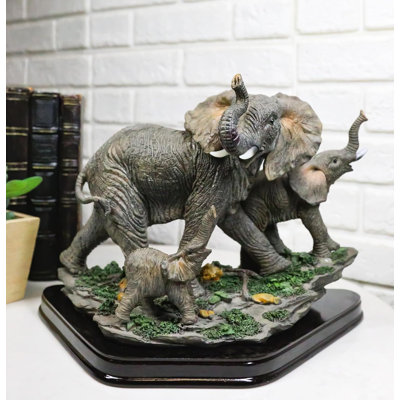 Figurine Safari trio marchant des éléphants et deux veaux sur un plancher de forêt