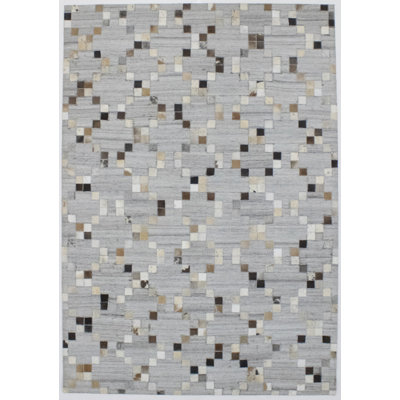 Tapis gris en similicuir Bucher