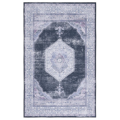 Tapis oriental noir et beige