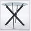 Table de salle à manger moderne noire avec plateau en verre trempé et pieds croisés en métal, parfaite pour économiser de l'espace dans les salons