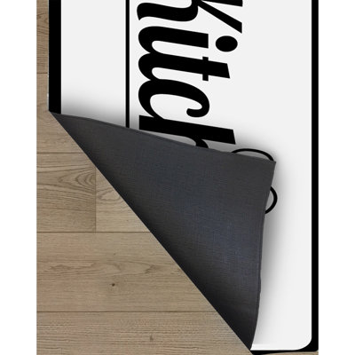 Tapis en jute tissé à la machine en noir / blanc