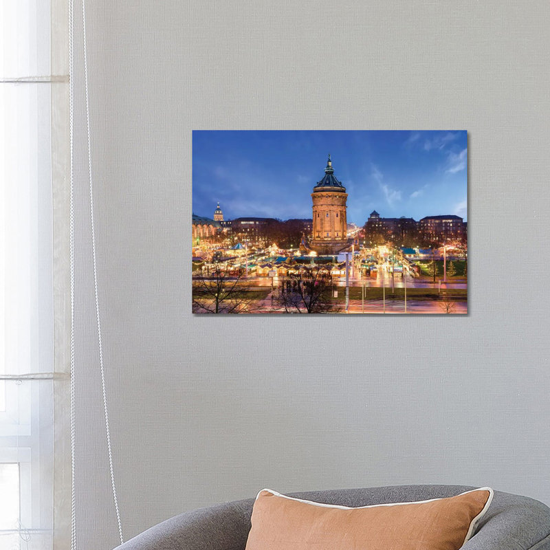 Christmas Market At The Wasserturm In Mannheim by Jan Becke - Wrapped Canvas Print, 66.04 cm H x 45.72 cm W x 1.91 cm D