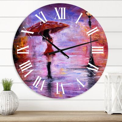 Horloge murale La femme au parapluie marchant sous la pluie I