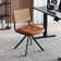 Markwart Armless Swivel Tufted Leather Task Chair with Rattan Low Back and Black Steel Frame