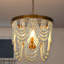 Lustre empire vieilli à 4 lumières Advith