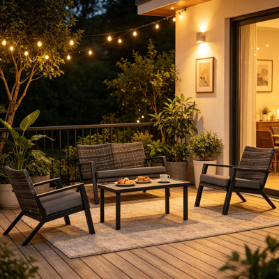 Ensemble de canapé d'extérieur en rotin 4 pièces avec coussins, ensemble de meubles de patio en osier PE avec causeuse et 2 fauteuils, ensemble de conversation de jardin moderne avec table basse pour terrasse, porche et cour, noir et gris