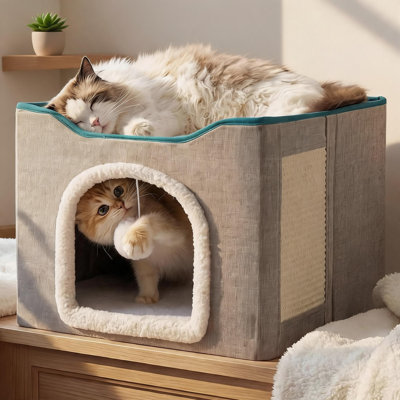 Grand lit pour chat pliable gris avec boule pelucheuse suspendue et poteau à griffer durable.