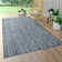 Ellzey Ikat Area Rug