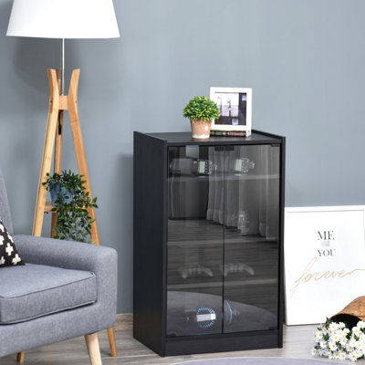 Armoire 5 supports, finition noire patinée. Portes en verre trempé, tablettes réglables. Peut accueillir un lecteur, un récepteur, une console de jeu, un ordinateur portable et des livres. Gère une étagère à câbles, avec portes et tablette