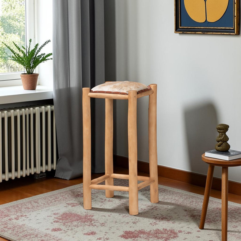 Tabouret de bar Atara rustique avec revêtement en cuir de chèvre authentique et structure en bois de teck
