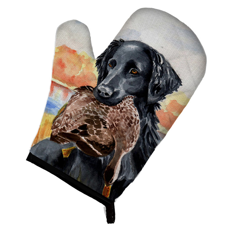 Four à caroline à trésors Flat Coated Retriever