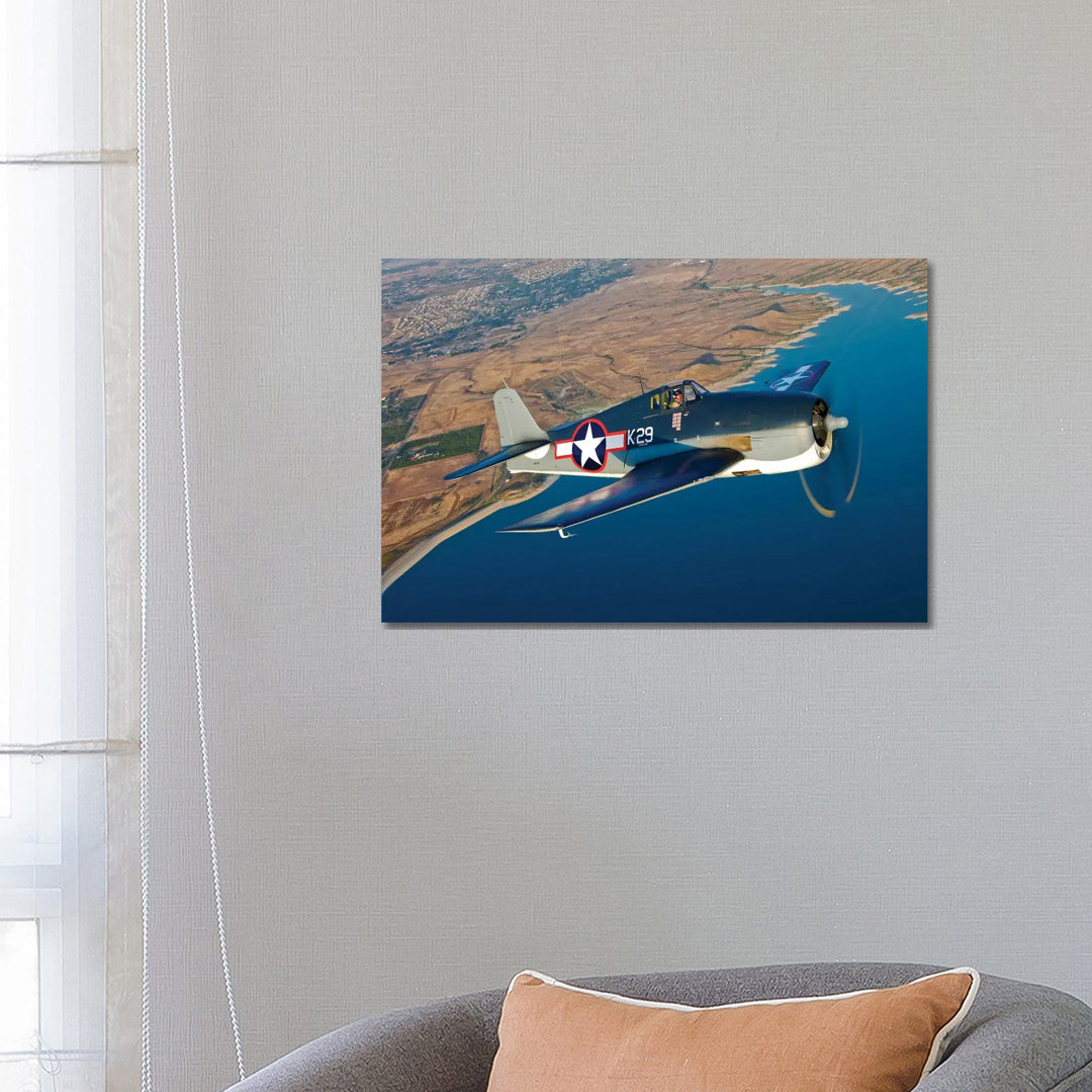 A Grumman F6F Hellcat Fighter Plane In Flight by Scott Germain - Wrapped Canvas Print