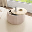 Repose-pieds rond avec rangement Dariyan-1050036548