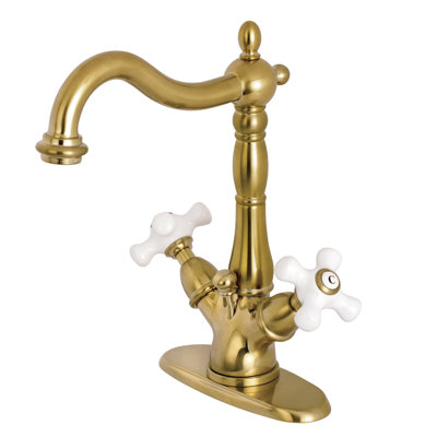 Kingston Brass Heritage Two-Handle 1-or-3 Hole Deck Mount Bathroom Faucet with Brass Pop-Up