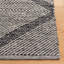 Tapis noir à motif géométrique tissé à plat à la main Abberton-312304237