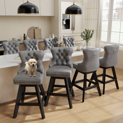 Ensemble de 8 tabourets de bar en bois touffeté et pivotant en velours