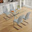 Ensemble de table de salle à manger moderne et luxueux en verre trempé avec 4 chaises en polyuréthane et des pieds en métal, parfait pour les expériences culinaires élégantes.-1093685665-1093685678